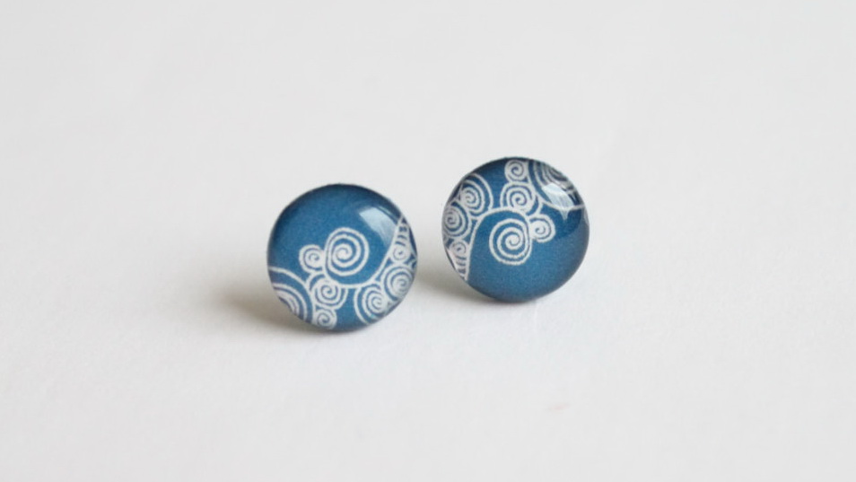 Steel blue swirly studs