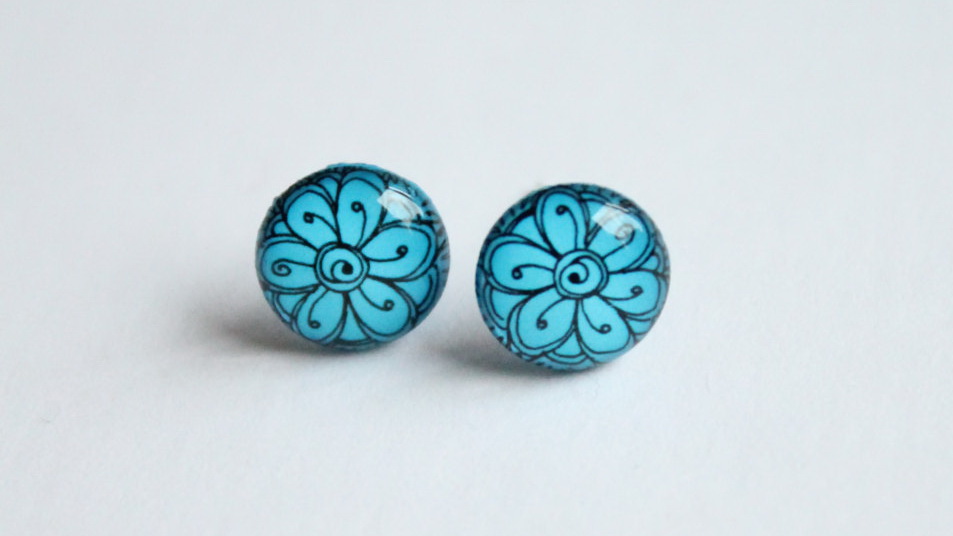 Flower pattern vivid blue studs