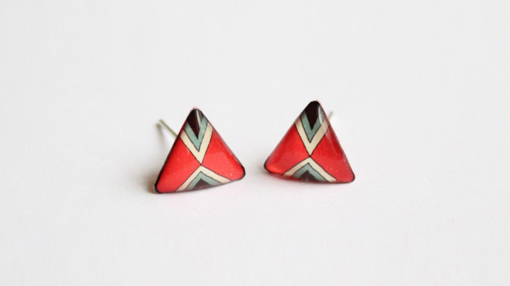 Bold and ethnic red triangle studs